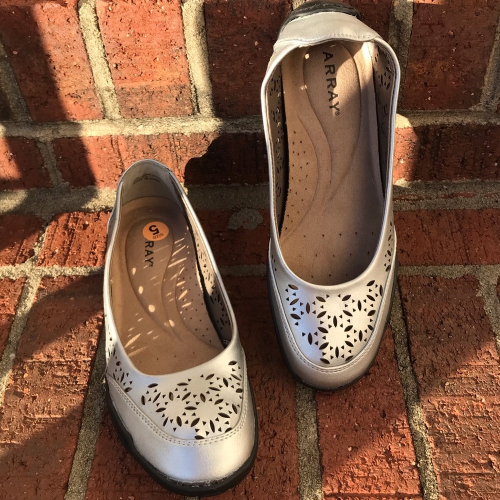 Array silver slip on shoes with cushioned footbed. Size 5 Please see pics
